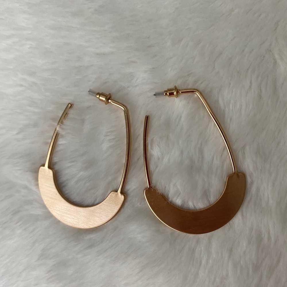 Large, partial hoop gold earrings